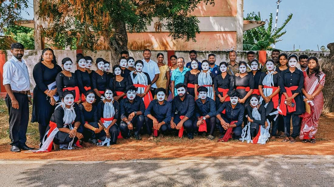 Facilitators and student volunteers in costume for the street drama, Vattakandal