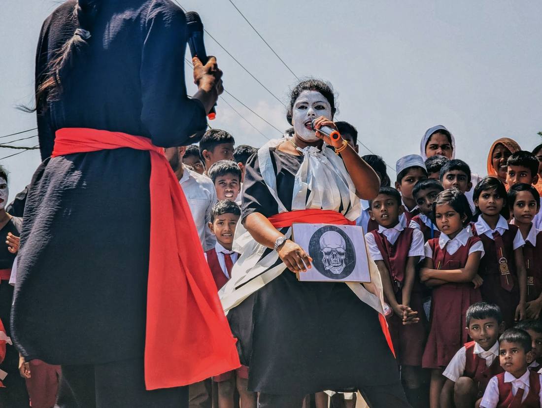 Performer holding a prop during the awareness drama